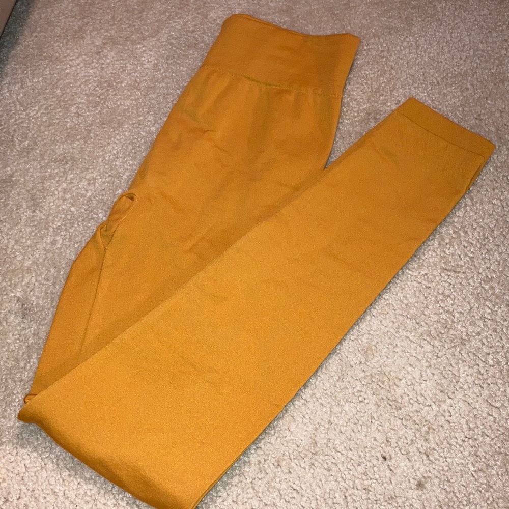 Women’s fleece lined leggings. Mustard in color.